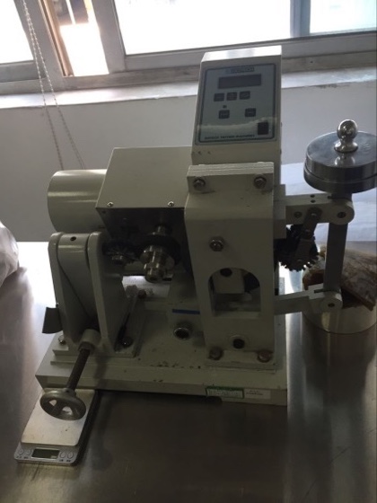 Rubber abrasion tester